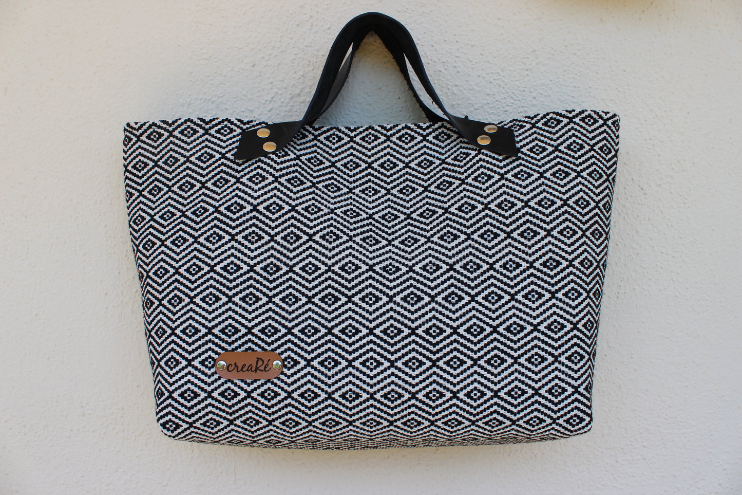 Borsa Rivetto
