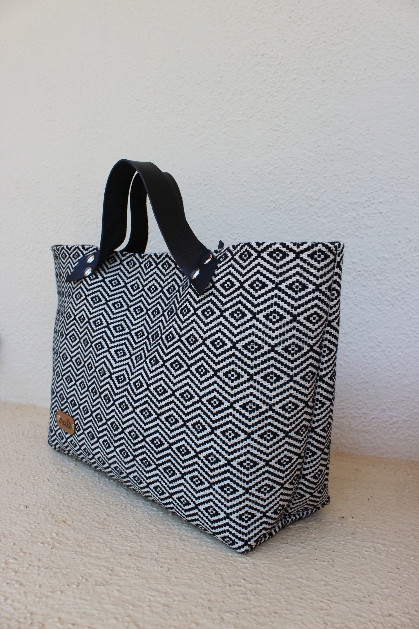 Borsa Rivetto