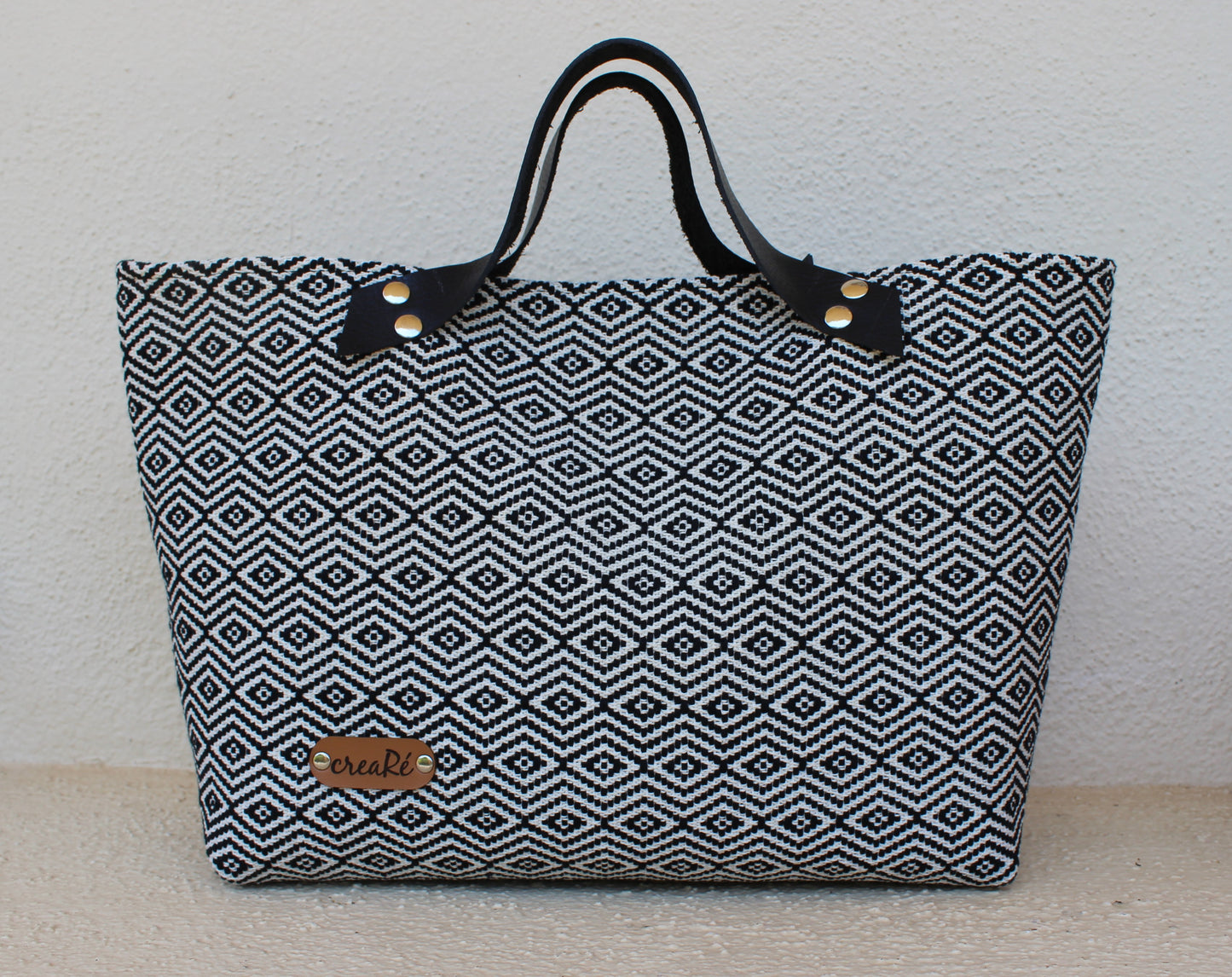 Borsa Rivetto